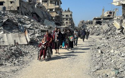 In besieged Beit Lahiya, rubble and decomposing corpses line the streets